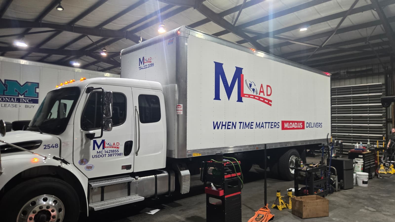 Mload 26-ft box truck in the maintenance shop