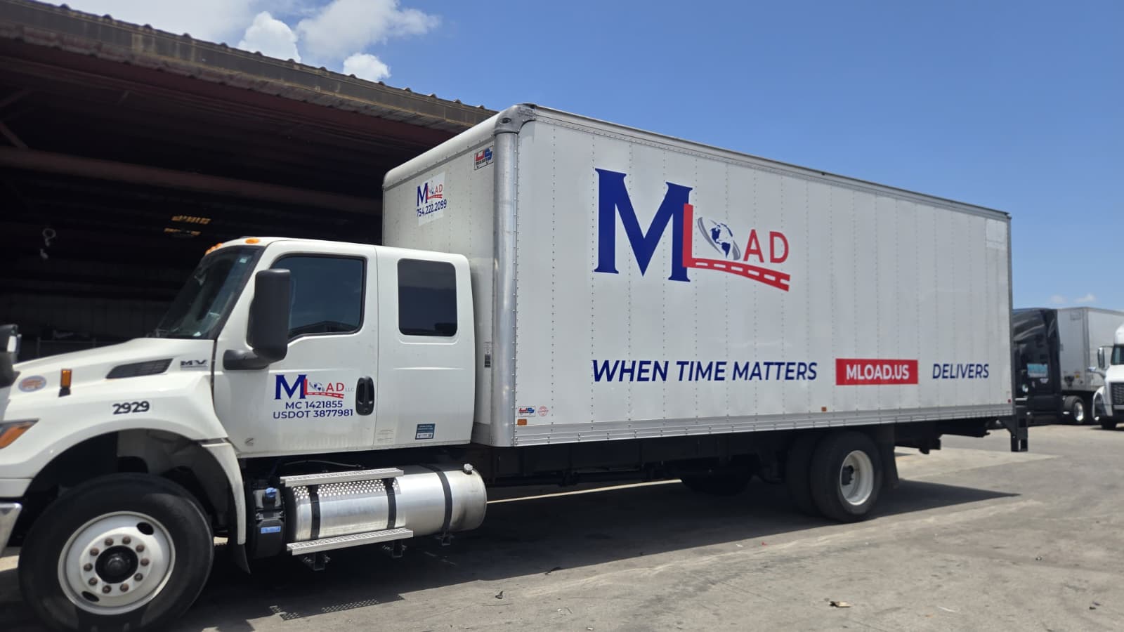 Mload box truck in the yard